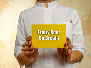 Healthcare concept about Fruity Odor On Breath with sign on the page.