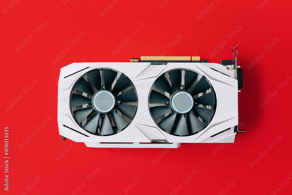 Aufkleber white graphics card with two black fans is located in the middle of red background. trending compute