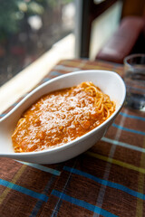 A tempting spaghetti with meat sauce, fork the pasta