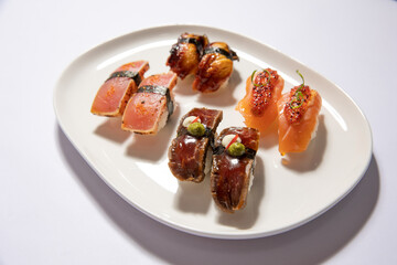 Sushi set served on a white plate