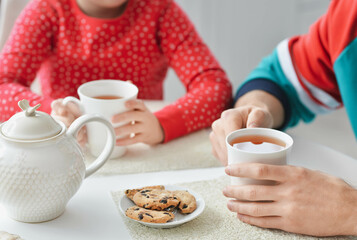 Happy father and daughter having breakfast at home