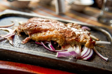 A tempting five mature rib-eye steak
