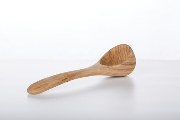 Wooden scoop spoon ladle isolated on white background