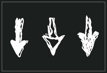 Obraz premium A set of vector drawn arrows. Isolated white arrows on a black background