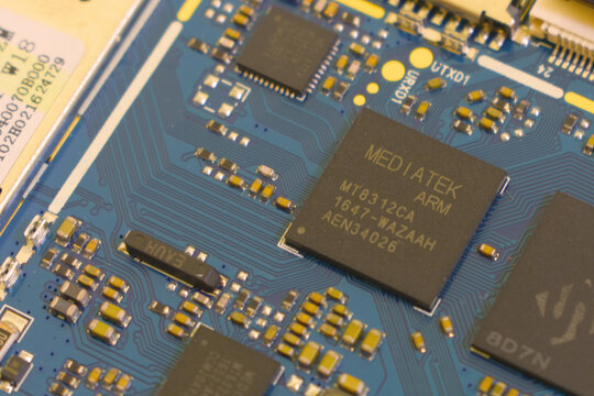 Sochi, Russia - March 4 2021: Mediatek ARM mobile processor on blue printed circuit board