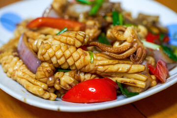 Chinese home cooking, fried squid with colored pepper