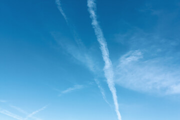 Fototapeta na wymiar White clouds on blue sky on a clear sunny day