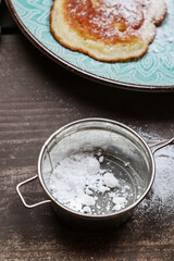 Traditional apple fritters on the plate.