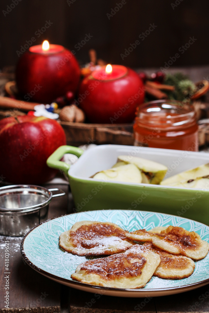 Sticker traditional apple fritters on the plate.