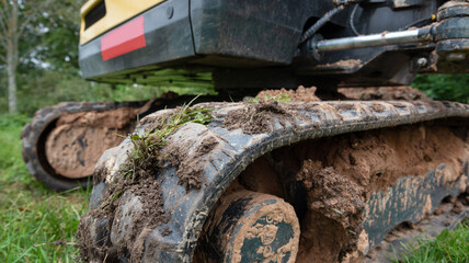 Excavator in countryside.