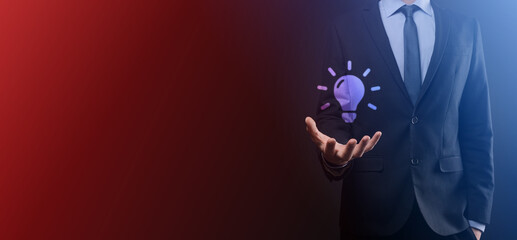 Hand holding light bulb. Smart idea icon isolated. Innovation, solution icon. Energy solutions. Power ideas concept. Electric lamp, technology invention. Human palm. Business inspiration.