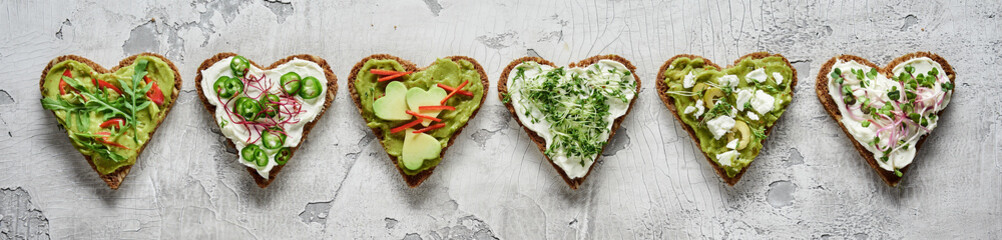 Row of healthy heart shaped bruschettas