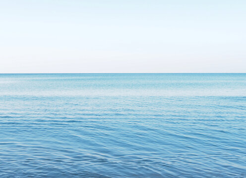 Blue ocean and blue sky background