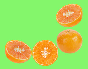 orange fruit top view isolated on green background.