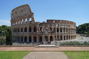 Fototapeta na wymiar Ancient Roman amphitheater and gladiator arena Colosseum aerial view, heart of Roman Empire, famous tourist landmark, guided tour concept, Rome, Italy