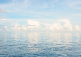 Calm sea landscape and sky reflection on sea surface