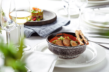 Beautifully decorated catering banquet table with different food snacks and appetizers