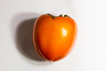 Persimmon on a light background