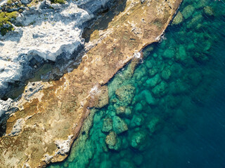 Fototapeta premium Top view from the turquoise Mediterranean sea and rocks
