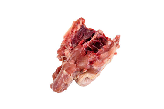 Raw chicken carcass is cut out on a white background.