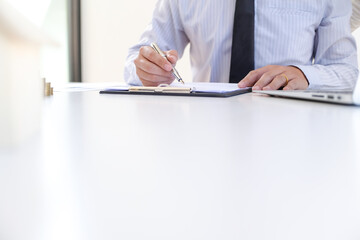 Business people signing contract making a deal with real estate agent Concept for consultant and home insurance concept.