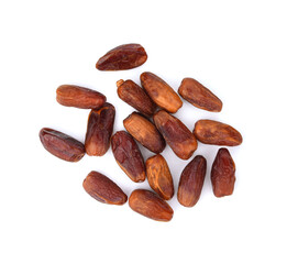 Obraz premium dry dates isolated on white background. Top view. Flat lay pattern