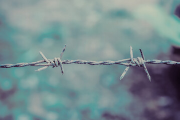 Grunge Barbed wire with blue vintage color  background