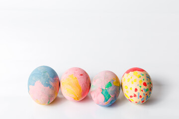 Happy easter, Easter painted eggs on white background for your decoration in holiday. Copy space.