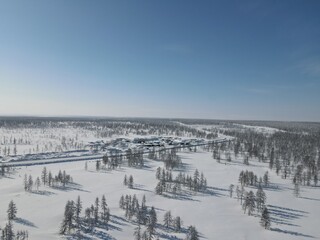 Fototapeta na wymiar Winter snow-covered expanses of endless Yakutia. Forests of larch, spruce and cedar.