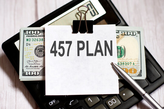 White paper with text 457 PLAN with dollars on calculator with pen