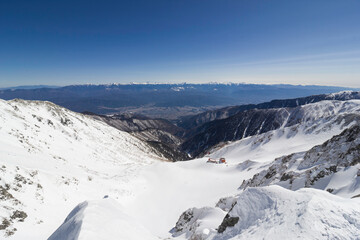 冬の宝剣岳から見る南アルプス