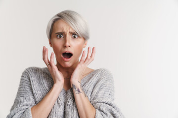 Scared beautiful silver girl expressing surprise at camera