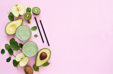 Vegetable smoothie with spinach and apple on a pink background. Advertising. Detox drink. The keto diet.