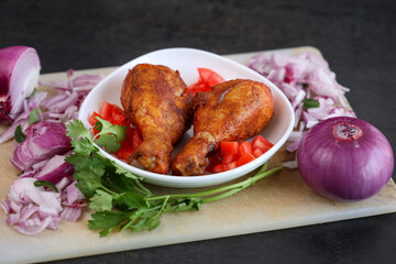 Indian Chicken fry leg piece, grilled chicken drumsticks hot and spicy meat dish barbecue roast  in Kerala India. Pakistan Indian non vegetarian food chicken 65 Ramadan, Easter	
