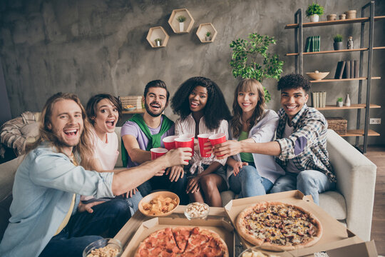 Photo of optimistic brunette blond hairdo guys ladies drink eat pizza on party wear casual cloth at home