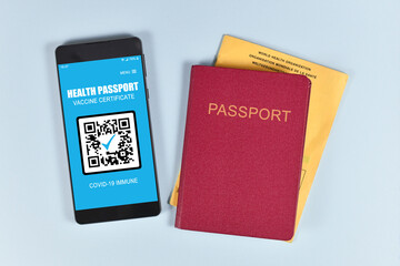 Concept for international Corona virus vaccine passport on mobile phone device to allow vaccinated...