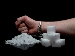 Handcuffed man is addicted to sugar and cocaine, sugar is more addictive than cocaine, white sugar...