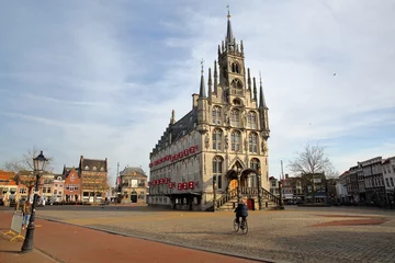 Deurstickers The impressive gothic styled Stadhuis (town hall, dated from 1450), located on the Markt (main Square), surrounded by historic houses in Gouda, South_Holland, Netherlands © Christophe Cappelli
