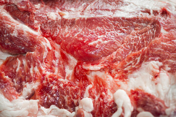 raw red meat, of fresh juicy meat. fragment of pork meat as a background texture composition. raw beef. fresh juicy red meat close-up, for cooking, frying. background, for text