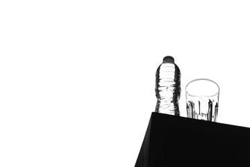 Silhouette bottle of water with glasses isolated on white background.