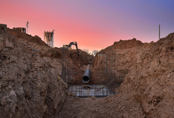 Trench for laying external sewer pipes. Sewage drainage system for a multi-story building. Civil...