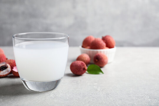 Freshly made lychee juice on light table. Space for text