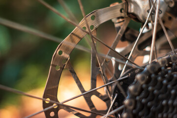 Obraz premium Mountain bike used and dirty gear cassette cogs macro close up shot outside