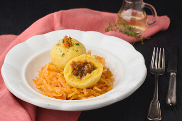 Potato dumpling stuffed with greaves