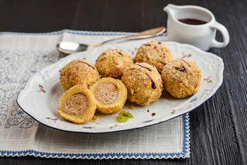 Chestnut dumplings with chocolate sauce