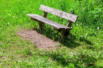 Old wooden bench on natural area . A place to relax in nature 