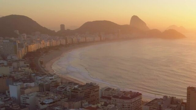 Aerial of Copacabana Beach and Sugarloaf Mountain at sunrise