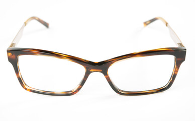 Eyeglasses with brown rim on white background