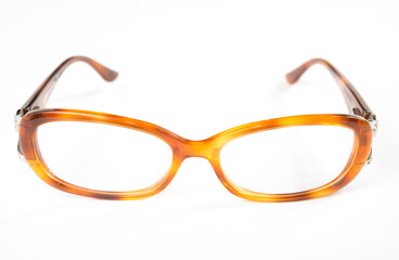 Eyeglasses with brown rim on white background