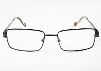 Eyeglasses with metal rim on white background